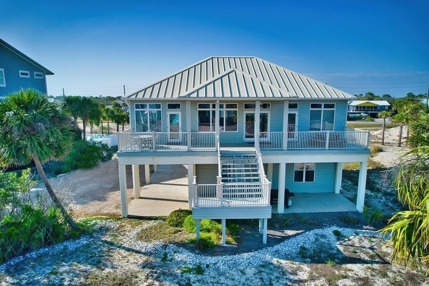 Welcome to Sandy Feet, a stunning 1st-tier beach home offering - Beach Home for sale in St. George Island, Florida on Beachhouse.com
