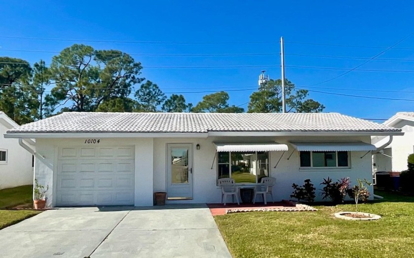 This is a 2-bedroom, 2-bathroom home with a 1-car garage - Beach Home for sale in Pinellas Park, Florida on Beachhouse.com