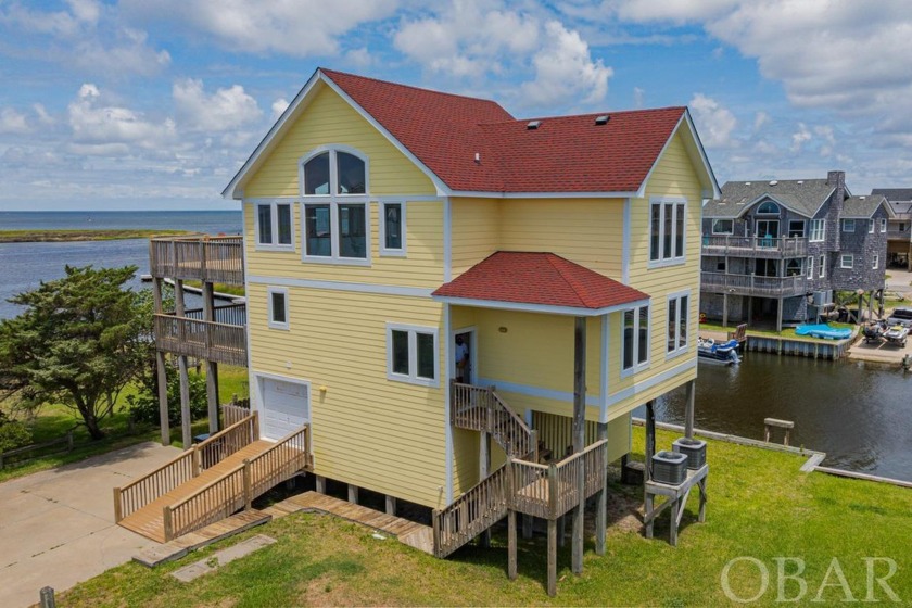 Discover the ultimate coastal retreat with this waterfront - Beach Home for sale in Avon, North Carolina on Beachhouse.com