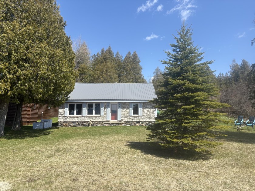 Nestled within the exclusive, 36,000-acre Hiawatha Club, this - Beach Home for sale in Naubinway, Michigan on Beachhouse.com