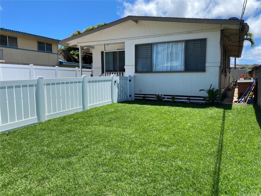 Classic Island home in Coconut Grove, Kailua. This 3 bedroom 1 - Beach Condo for sale in Kailua, Hawaii on Beachhouse.com