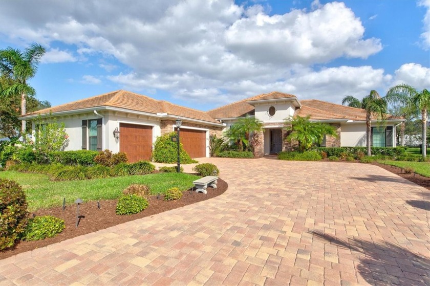 Your dream home awaits! This custom Bruce Williams home offers a - Beach Home for sale in Bradenton, Florida on Beachhouse.com