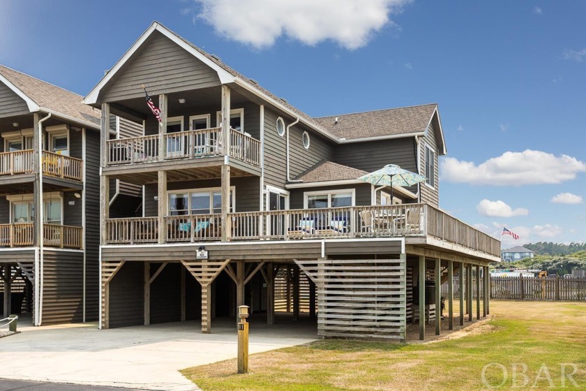 This lovely semi-oceanfront beach retreat provides ocean views - Beach Condo for sale in Southern Shores, North Carolina on Beachhouse.com