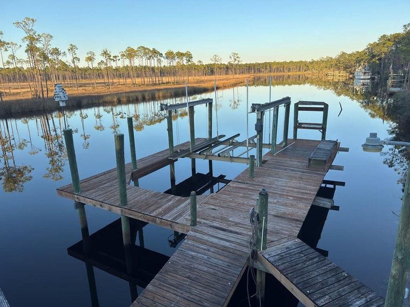 Discover the best of Carrabelle riverfront living at 897 Mill - Beach Home for sale in Carabelle, Florida on Beachhouse.com