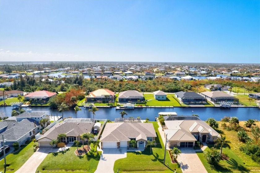 Experience waterfront living at its finest in this stunning - Beach Home for sale in Port Charlotte, Florida on Beachhouse.com