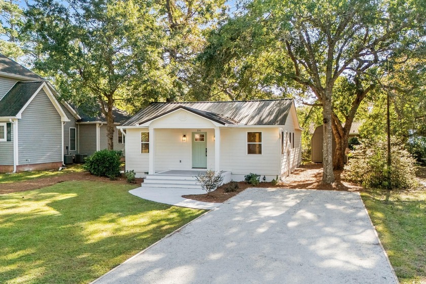 Completely reimagined from the ground up, this 2 bedroom, 2.5 - Beach Home for sale in Surfside Beach, South Carolina on Beachhouse.com