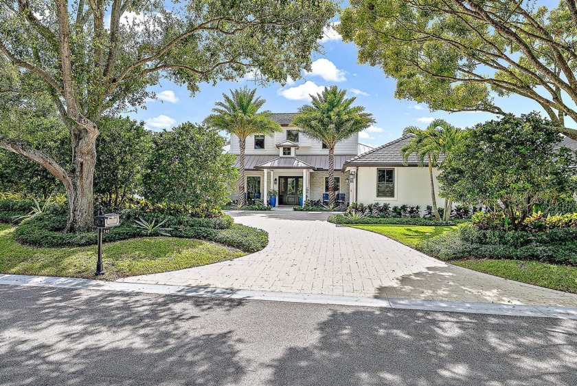 This custom estate home is the perfect blend of transitional - Beach Home for sale in Jupiter, Florida on Beachhouse.com