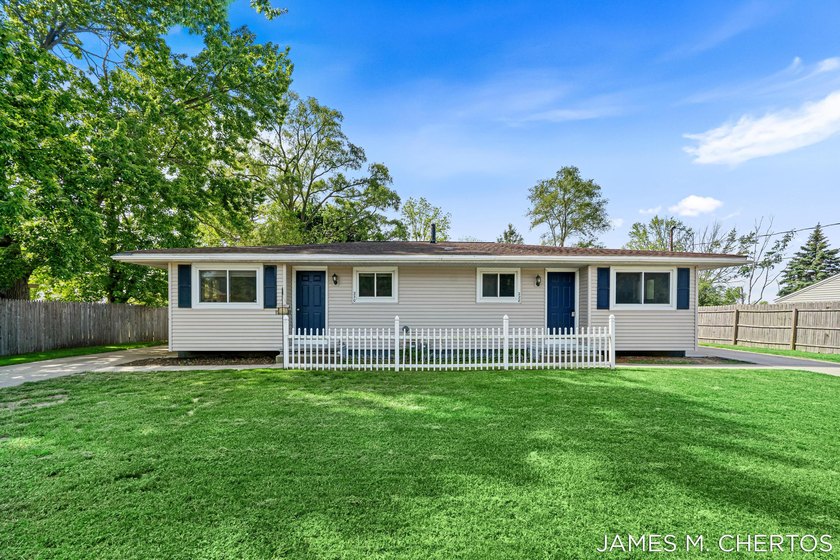 Charming walkout duplex on a spacious lot in the Village of - Beach Home for sale in Spring Lake, Michigan on Beachhouse.com