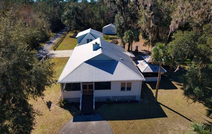 A VERY PRIVATE SERENE SETTING WITH ONLY 3 NEIGHBORS-A SEPARATE - Beach Home for sale in Apalachicola, Florida on Beachhouse.com