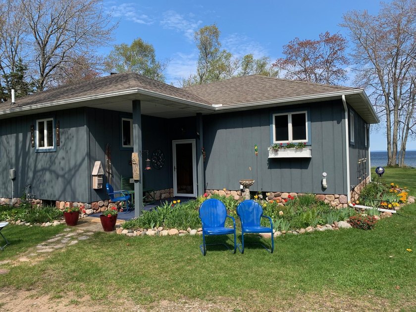 Just a mile north of town, this delightful 3 bedroom 2 1/2 bath - Beach Home for sale in Paradise, Michigan on Beachhouse.com