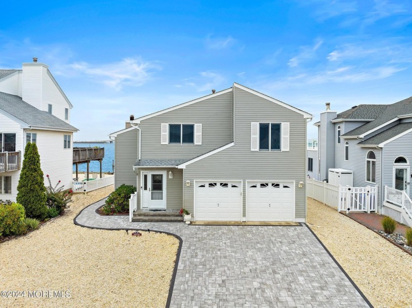 Stafford Twp.- Living on the Water is All About Location and - Beach Home for sale in Manahawkin, New Jersey on Beachhouse.com