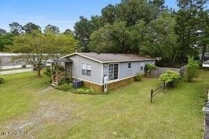 Welcome to this beautifully updated double wide mobile home - Beach Home for sale in Diamondhead, Mississippi on Beachhouse.com