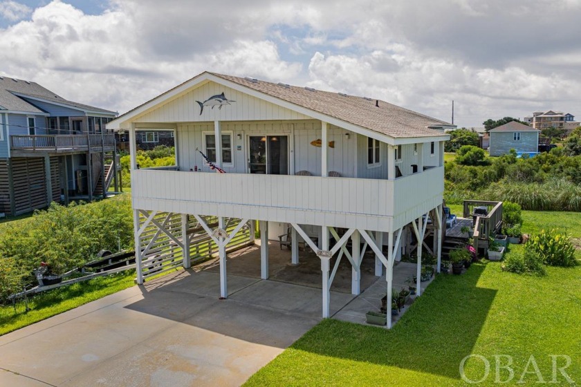 Discover your coastal haven in the serene Hatteras Estates - Beach Home for sale in Hatteras Island, North Carolina on Beachhouse.com