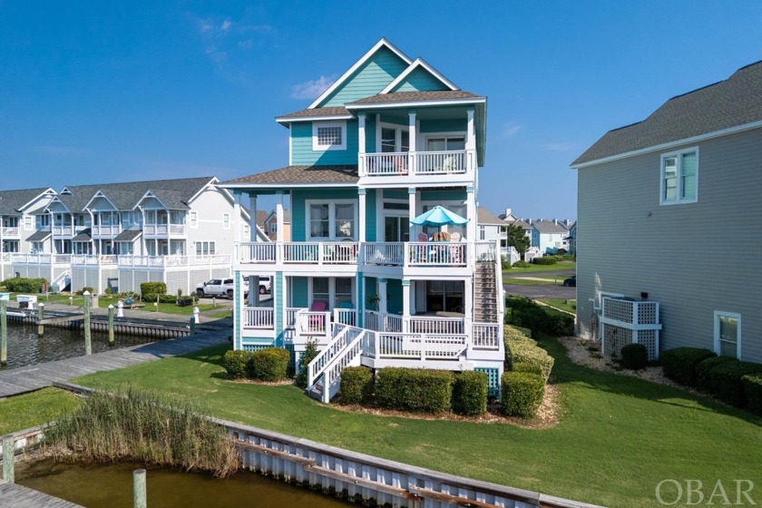 The picturesque views of 61 Sailfish Ct. are in a league of - Beach Home for sale in Manteo, North Carolina on Beachhouse.com