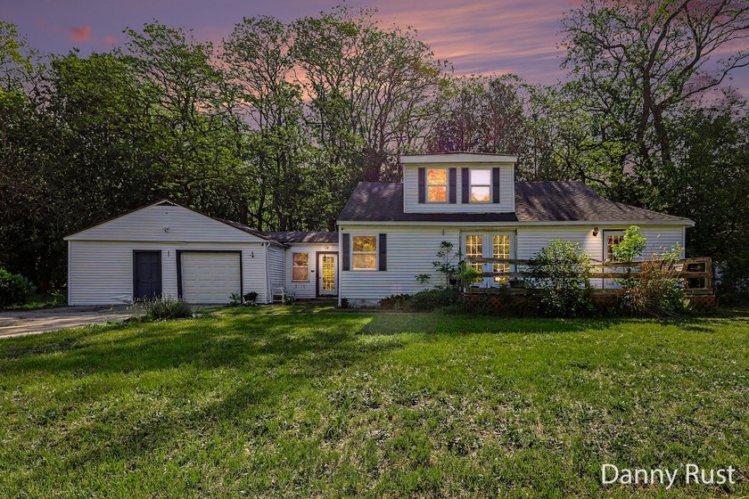 Nestled on a quiet, peaceful dead-end drive in the highly - Beach Home for sale in Muskegon, Michigan on Beachhouse.com