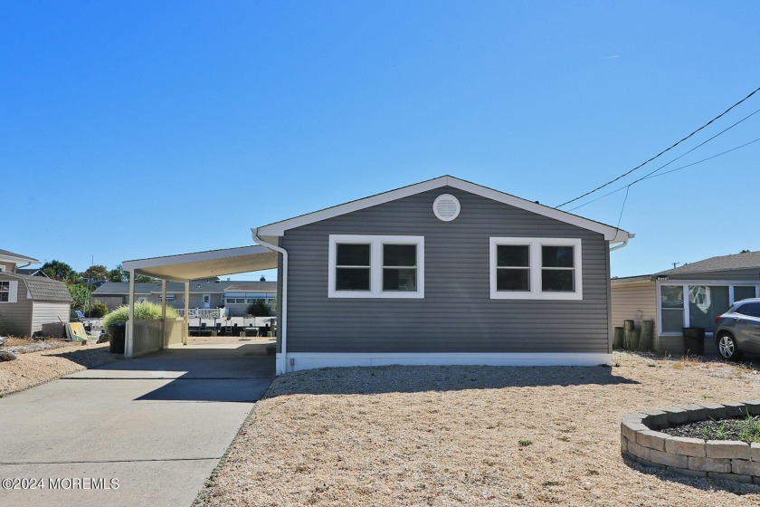 Welcome to this beautifully redone waterfront home in the highly - Beach Home for sale in Forked River, New Jersey on Beachhouse.com