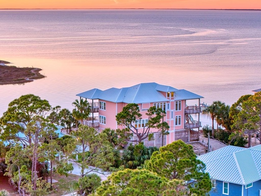 Panoramic sunset views and unmatched waterfront living in this - Beach Home for sale in St. George Island, Florida on Beachhouse.com
