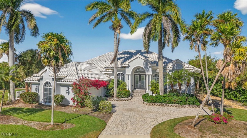 On a premier golf course lot in The Dunes, this exquisite - Beach Home for sale in Sanibel, Florida on Beachhouse.com