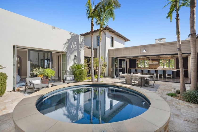 Nestled within the prestigious guard-gated enclave of Crystal - Beach Home for sale in Newport Coast, California on Beachhouse.com