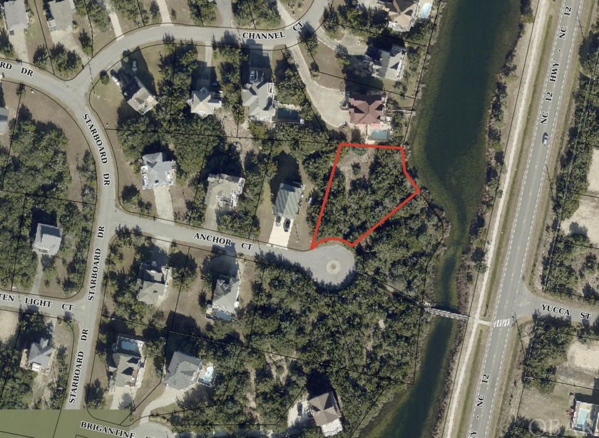 This lakefront vacant lot offers an unparalleled opportunity to - Beach Lot for sale in Avon, North Carolina on Beachhouse.com