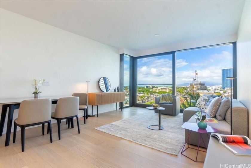 This elegant 2-bedroom, 2-bathroom condo features wood flooring - Beach Condo for sale in Honolulu, Hawaii on Beachhouse.com