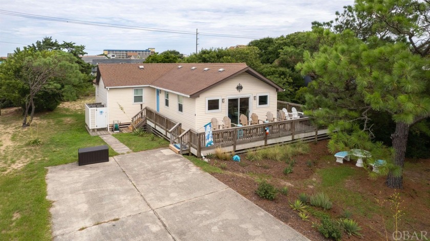 This adorable cottage is located in Old Nags Head Cove.  This - Beach Home for sale in Nags Head, North Carolina on Beachhouse.com