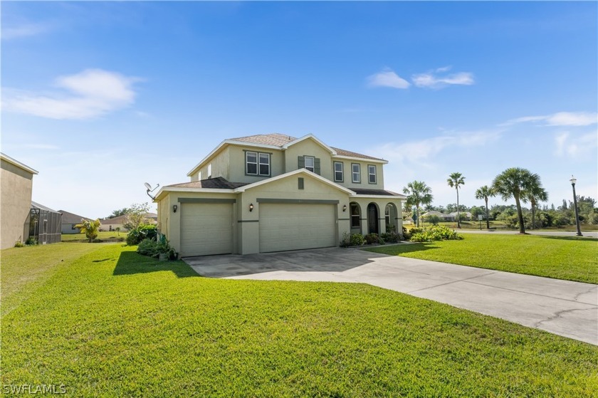 Do not missed on this captivating lakefront 2 story home on - Beach Home for sale in Lehigh Acres, Florida on Beachhouse.com
