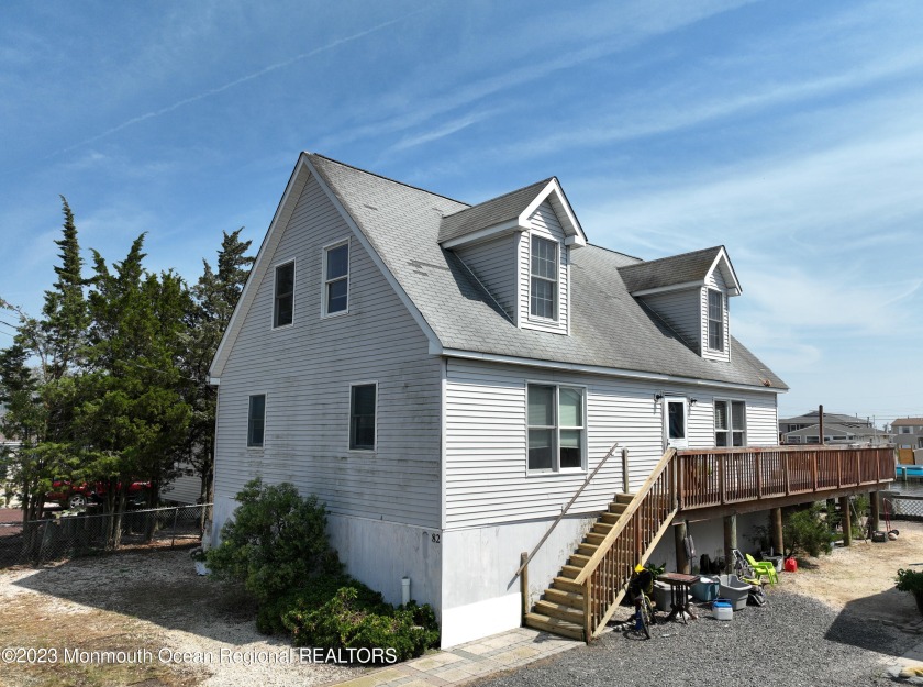 This charming  20 year young cottage is on a deep water lagoon - Beach Home for sale in Tuckerton, New Jersey on Beachhouse.com