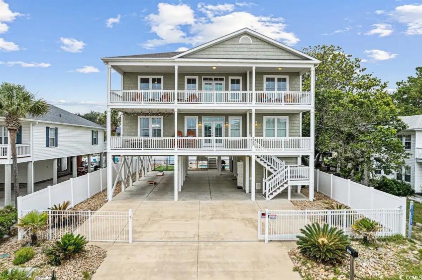 Discover coastal elegance in this stunning 6 bed, 5.5 bath beach - Beach Home for sale in North Myrtle Beach, South Carolina on Beachhouse.com