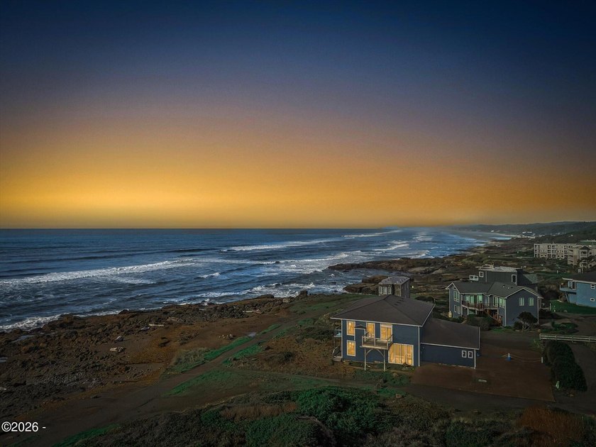 Commanding panoramic coastline views, this oceanfront residence - Beach Townhome/Townhouse for sale in Yachats, Oregon on Beachhouse.com