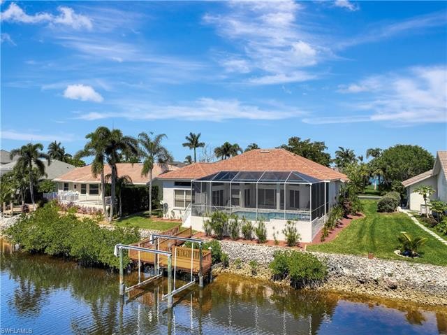 EASY GULF ACCESS waterfront home with private dock & lift - Beach Home for sale in Fort Myers, Florida on Beachhouse.com