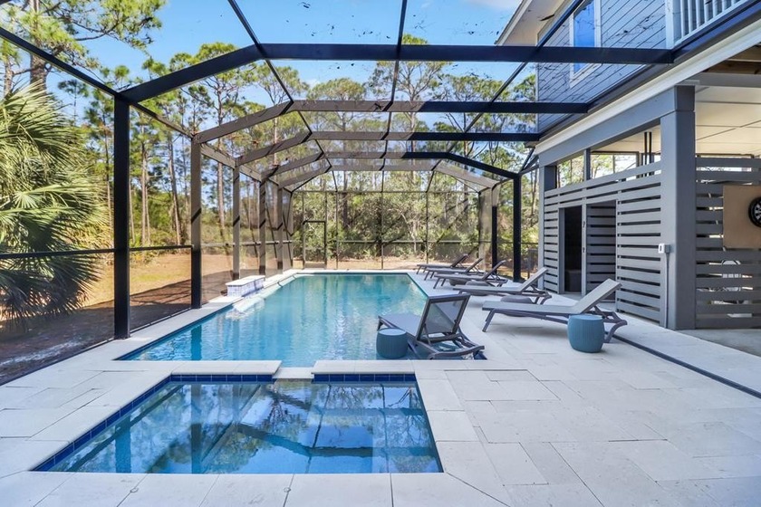 NEW LISTING with a MOTIVATED Seller! Envelop yourself in a true - Beach Home for sale in St. George Island, Florida on Beachhouse.com