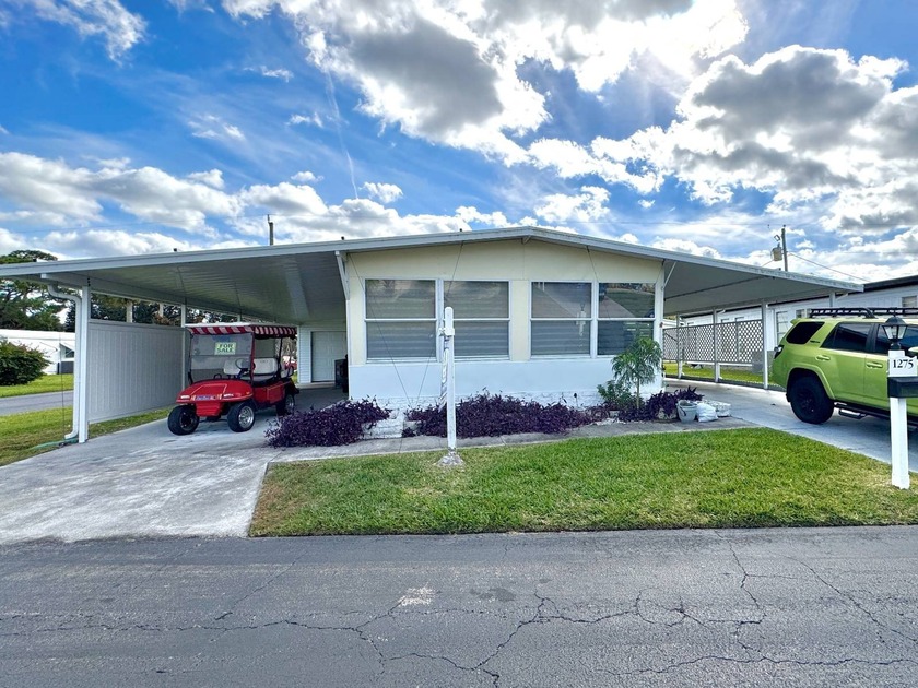 DOUBLE DRIVEWAY with Garage that will fit a Golf cart or - Beach Home for sale in Daytona Beach, Florida on Beachhouse.com