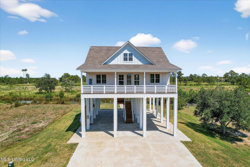 Discover coastal living at its finest in Admiral Isles! 5089 - Beach Home for sale in Bay Saint Louis, Mississippi on Beachhouse.com