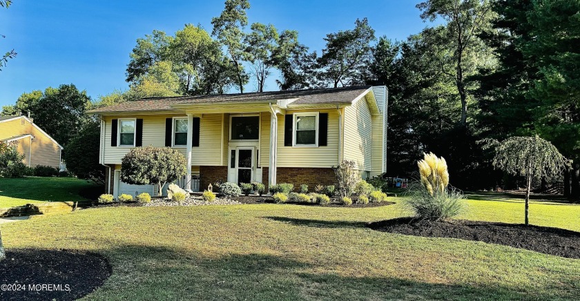 This spectacular home sits on an oversized lot in one of - Beach Home for sale in Tinton Falls, New Jersey on Beachhouse.com