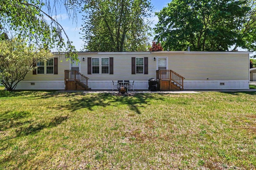 Welcome to easy living in Tamarac Village! This spacious - Beach Home for sale in Ludington, Michigan on Beachhouse.com