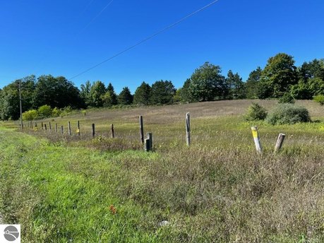 Country living near Traverse City. Only 5 miles west of TC, this - Beach Acreage for sale in Cedar, Michigan on Beachhouse.com