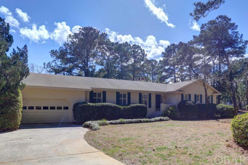 This Southern Shores Canal Front Beauty is a MUST SEE! Tucked - Beach Home for sale in Southern Shores, North Carolina on Beachhouse.com