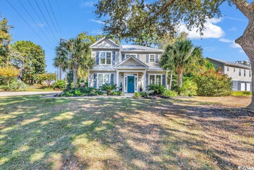 Welcome to this beautifully crafted 4-bedroom, 2.5-bath home - Beach Home for sale in Murrells Inlet, South Carolina on Beachhouse.com