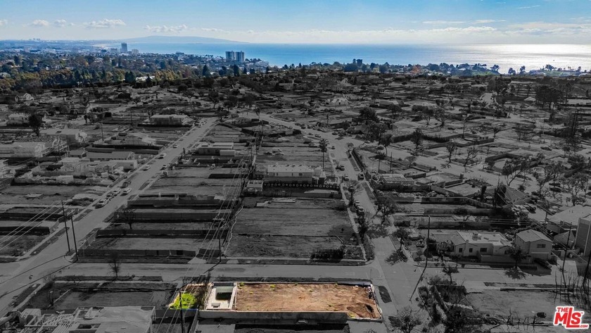 Situated on a coveted corner lot in the Alphabet Streets, 900 - Beach Lot for sale in Pacific Palisades, California on Beachhouse.com