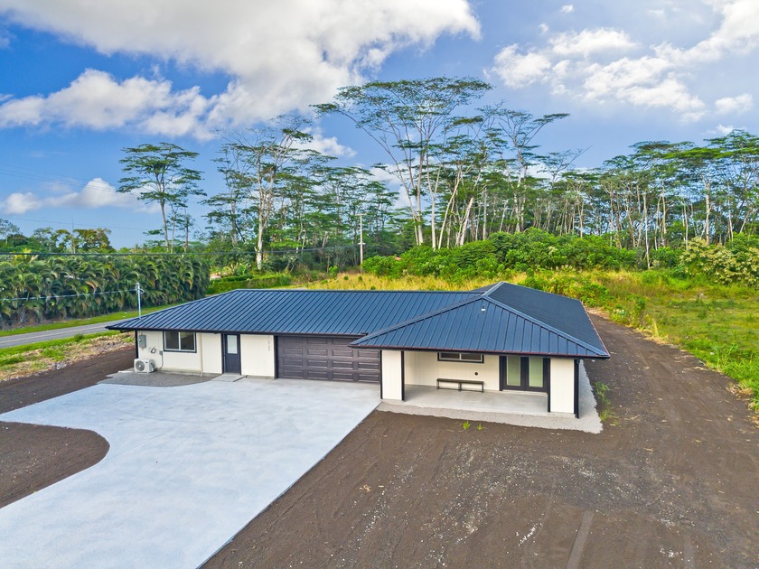 Brand new and custom built, this thoughtfully designed home sits - Beach Home for sale in Keaau, Hawaii on Beachhouse.com