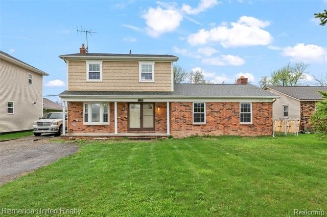 Custom-built 2-story home nestled on a partially wooded 1-acre - Beach Home for sale in Rockwood, Michigan on Beachhouse.com