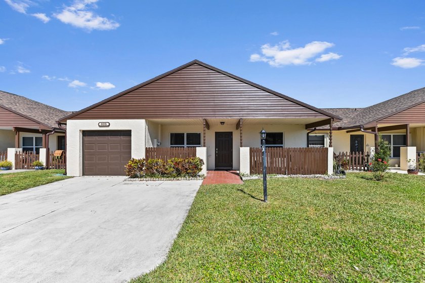 Welcome to 8515 Lakepoint Court, a bright and beautifully - Beach Home for sale in Lake Worth, Florida on Beachhouse.com