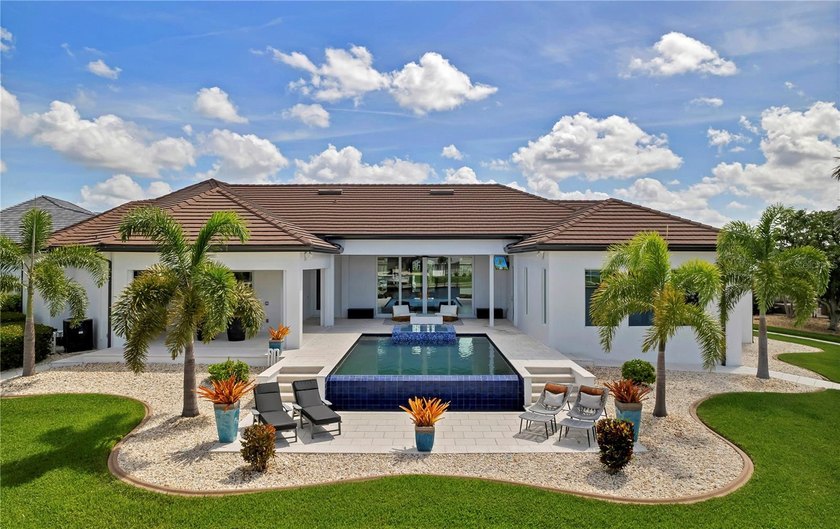 Positioned on a premier 255-foot waterfront key lot in the heart - Beach Home for sale in Punta Gorda, Florida on Beachhouse.com