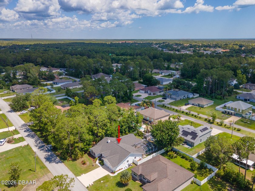 This meticulously upgraded home on an oversized lot of .49 acres - Beach Home for sale in Palm Coast, Florida on Beachhouse.com