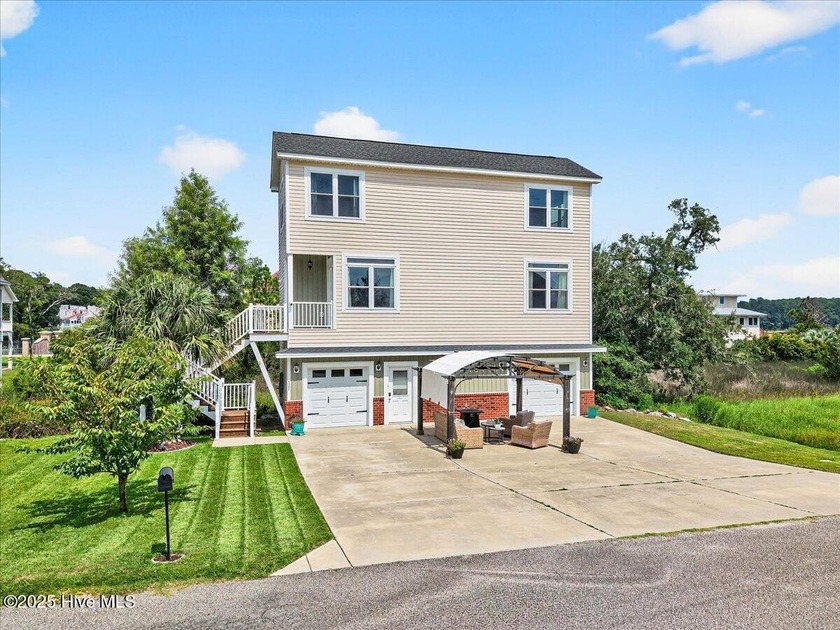 Immaculate 3-Story home with Marsh & ICW views! This stunning - Beach Home for sale in Little River, South Carolina on Beachhouse.com