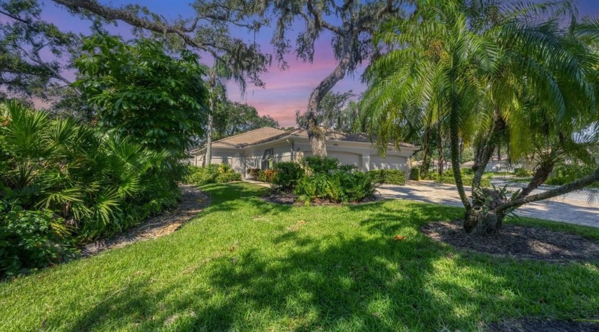 Serene, easy-living villa with treed views in the prestigious - Beach Home for sale in Sarasota, Florida on Beachhouse.com