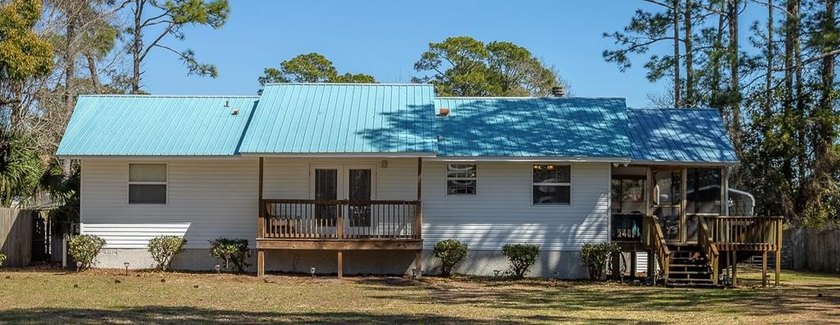 Enjoy stunning bay views from this well-maintained Florida - Beach Home for sale in Eastpoint, Florida on Beachhouse.com