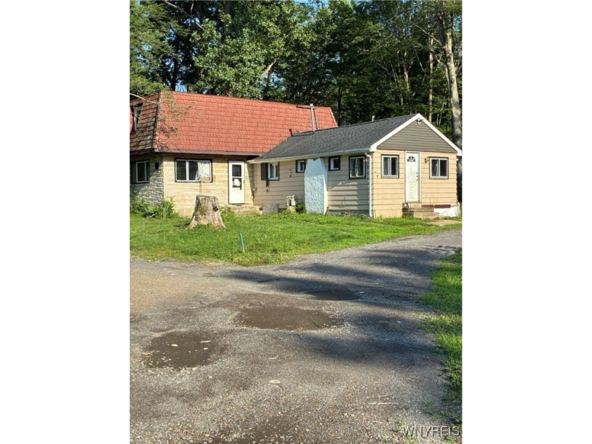 ***PRICE DRAMATICALLY REDUCED***OWNER MUST SELL AND IS OPEN TO - Beach Home for sale in Angola, New York on Beachhouse.com