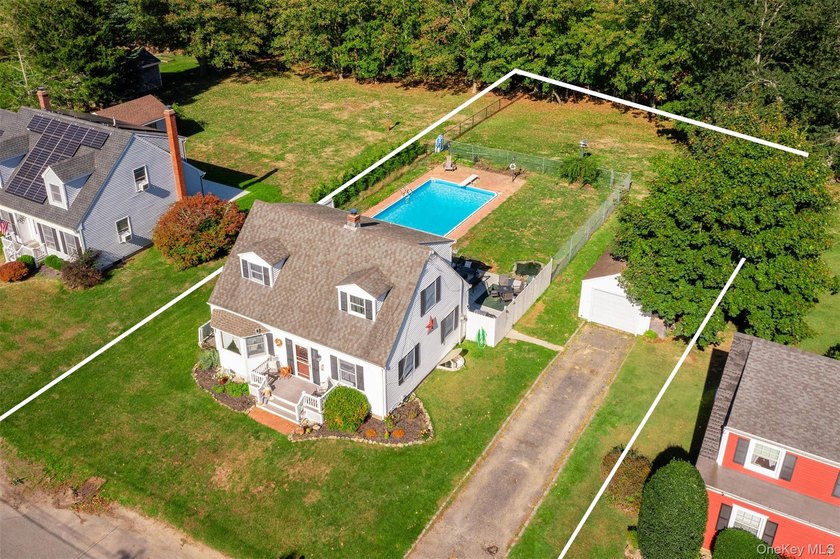 Spacious Cape with Garage, Nice Yard and Inground Pool, Ideally - Beach Home for sale in Greenport, New York on Beachhouse.com
